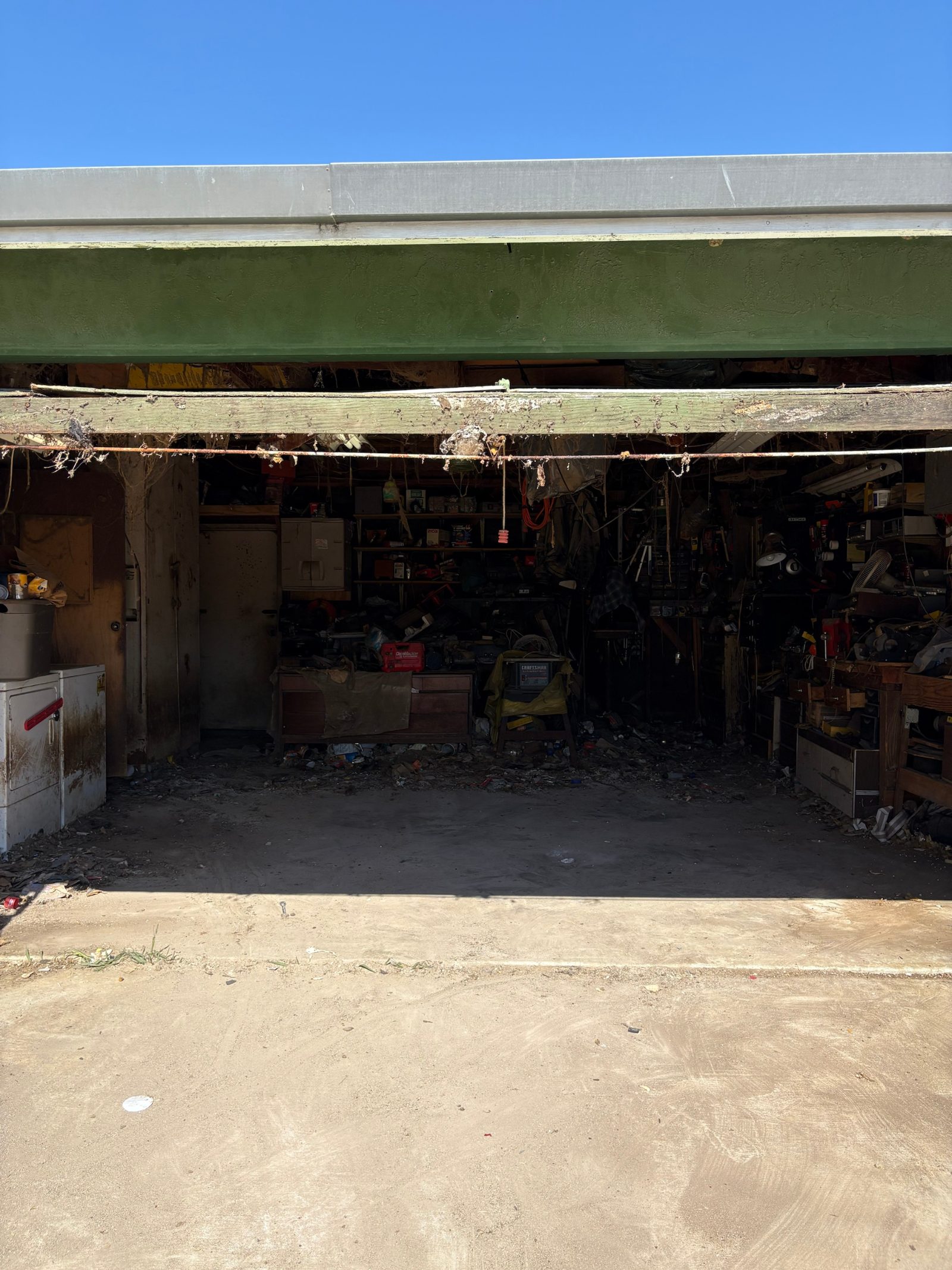 Watsonville garage after the floor was cleared during a hoarder cleanout