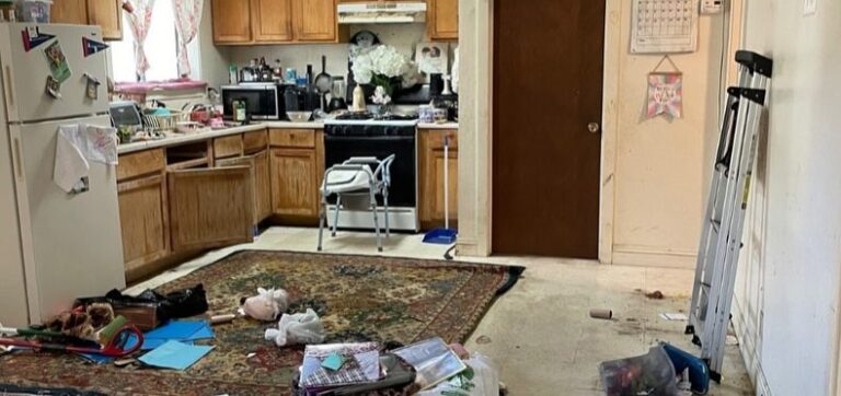 Kitchen with clutter before cleanout